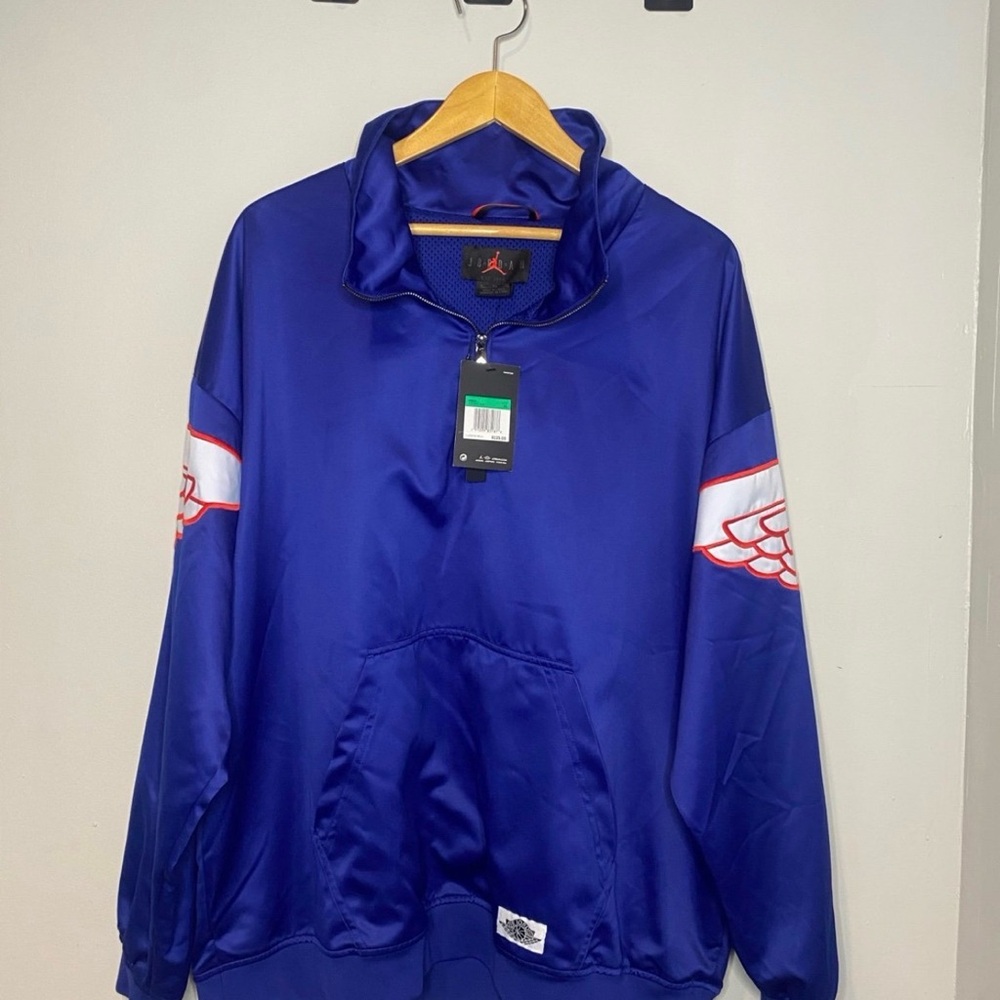 Jordan Men's Blue Windbreaker with White and Red Accents